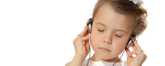 Girl listening to NLP tracks | NLP World