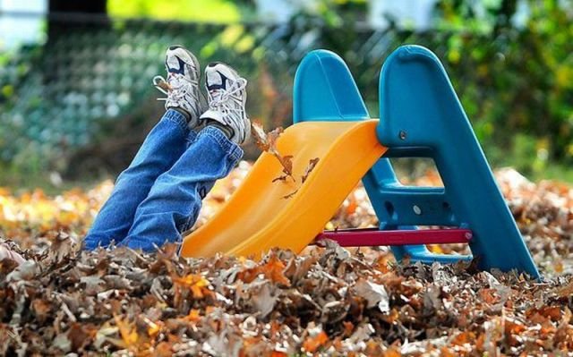 Photograph of a child having fun on a slide | NLP World.