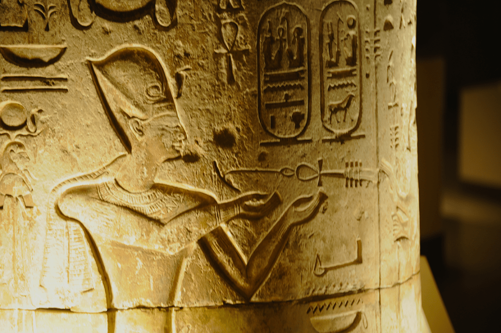 Hieroglyphs on stone pillar