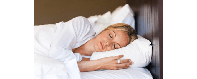 deep sleep image of woman in bed